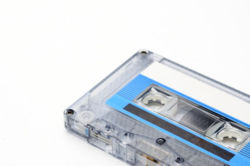 Compact audio tapes for magnetic recording on a white background.Compact cassettte