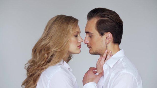 Love, passion, relationship conception: young couple hugs and kisses. Valentines day.