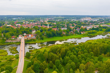 Beautiful panoramic aerial view photo from flying drone to Venta Rapid waterfall,the widest...