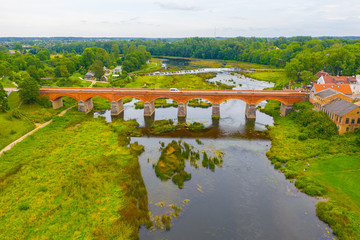 Beautiful panoramic aerial view photo from flying drone to Venta Rapid waterfall,the widest...