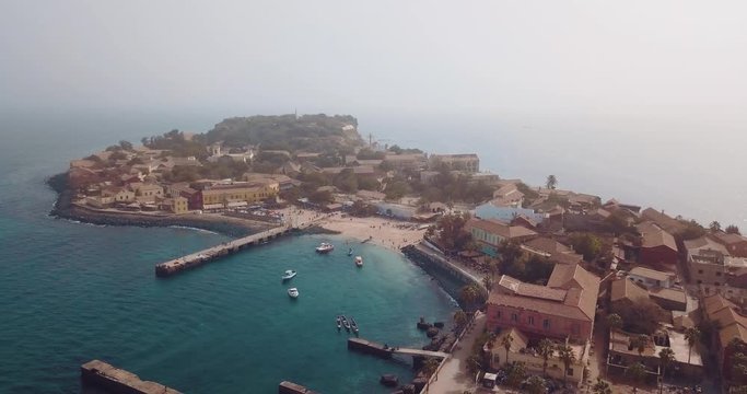 the island gore from which slaves were exported from Africa, turquoise water and yellow sand photographed from the air