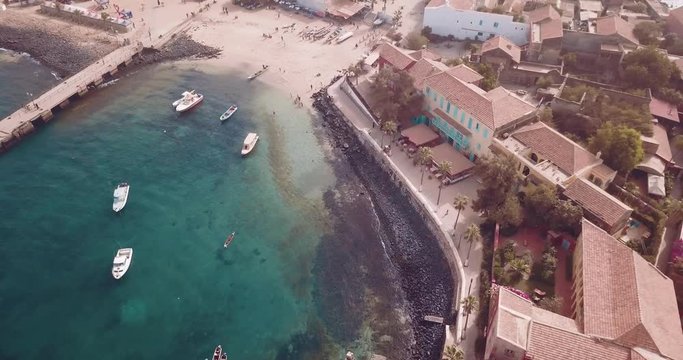 the island gore from which slaves were exported from Africa, turquoise water and yellow sand photographed from the air