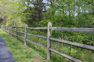 wooden fence in a field