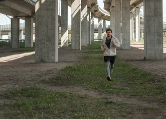 Fototapeta na wymiar Man jogging during street workout