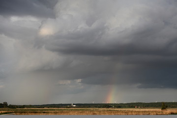 Fototapeta na wymiar rainbow over storm