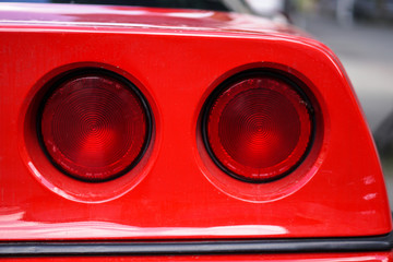 Taillight of a red car. Stop signal close up. Stock background for design