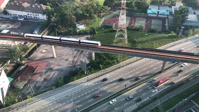 Petaling Jaya, Malaysia: May 15, 2020: 4 coaches Light Rapid Transit or LRT at Federal Highway, Petaling Jaya, Malaysia. 