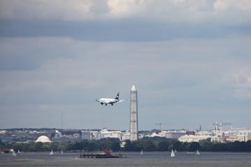 Fototapeta na wymiar airport control tower, airplane in Washington DC, on the lake