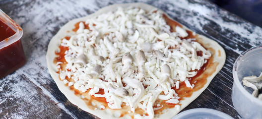 pizza, that spins into cooked pizza, Pizza cooking process.vintage tone.selective focus.