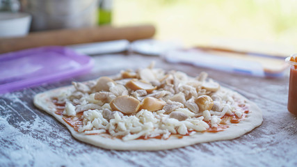 pizza, that spins into cooked pizza, Pizza cooking process.vintage tone.selective focus.