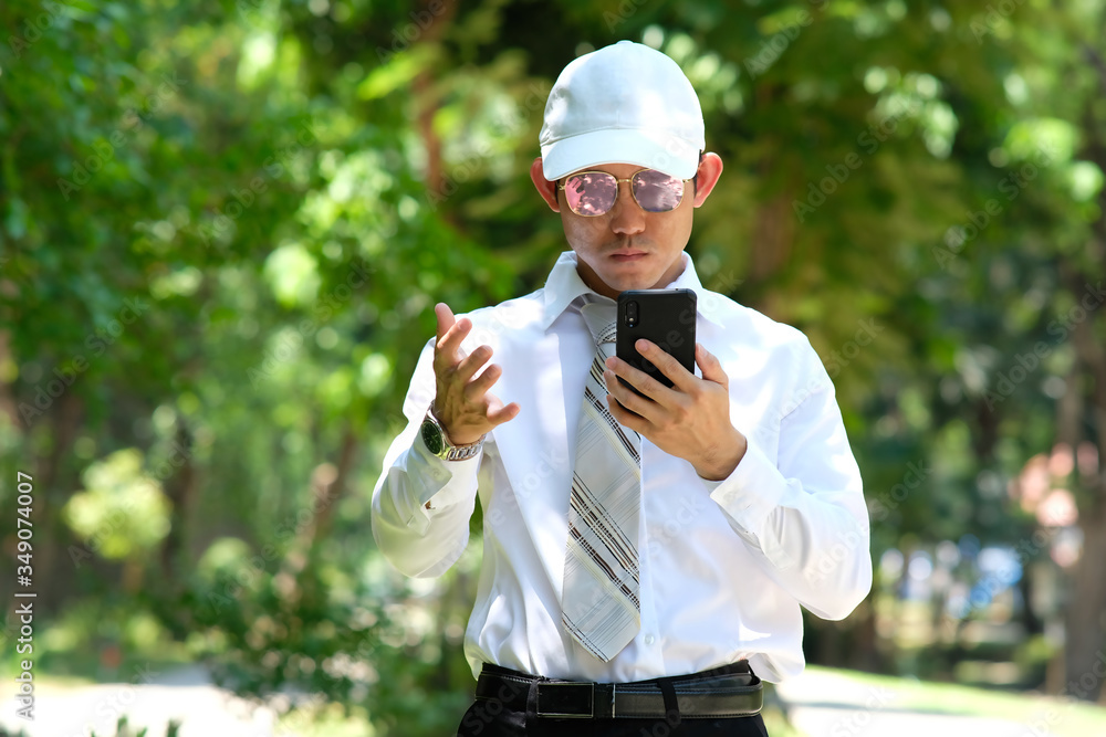 Poster close up businessman using a smartphone and space for text