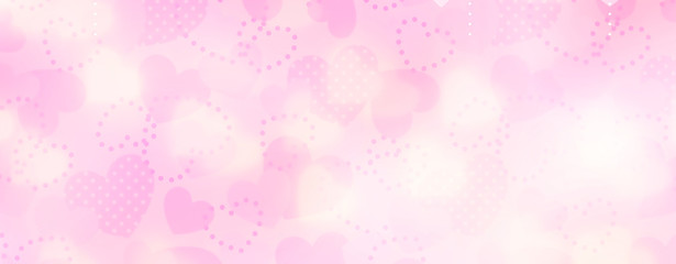 Valentine abstract background with soft bokeh and pink hearts