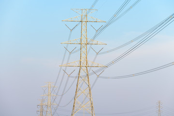 High voltage pole on blue sky