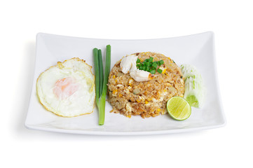 Thai cuisine, Fried rice with crab and fried egg isolated on white background with clipping path.