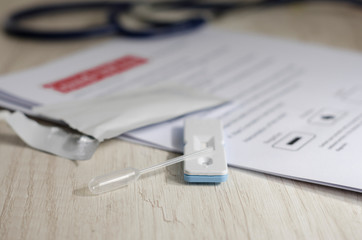 Laboratory scientist performs a rapid diagnostic test (rdt) for antibodies to detect the presence of viral proteins. caused by coronavirus disease COVID-19, PCR laboratory test. Inputs for testing