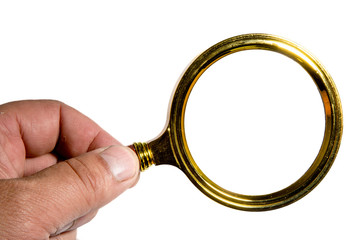 magnified glass in a hand on a white background