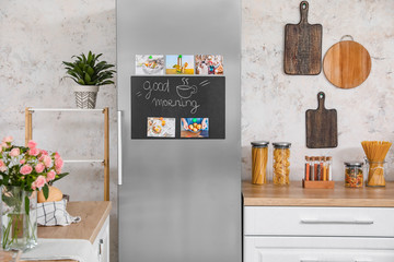 Big modern refrigerator in kitchen