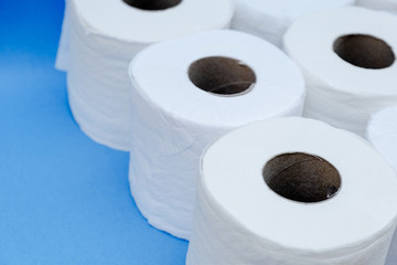Toilet paper isolated on a blue background