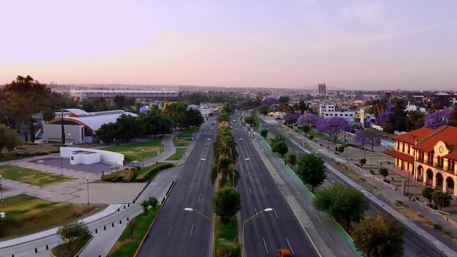 sunrise on a main avenue in a mexico city