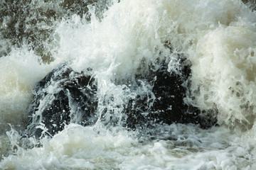 Turbulent water of Cargill Falls in Putnam, Connecticut in springtime.