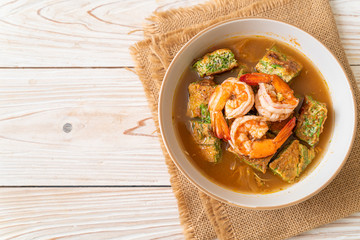 Sour soup made of Tamarind Paste with Shrimps and Vegetable Omelet