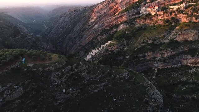 Hamatoura Monastery, mountainous countryside and switchback road, Kesba, Lebanon, aerial