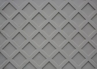 Grey concrete surface with raised ornamentation