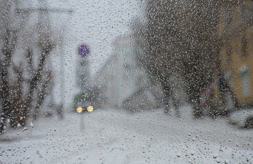 Russia. Khabarovsk-April 2020: Spring snowstorm in Khabarovsk. View of Istomina street