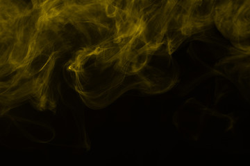 Yellow steam on a black background.