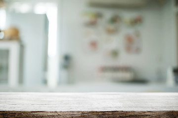 Wood desk space and blurred of kitchen background. for product display montage. business presentation.