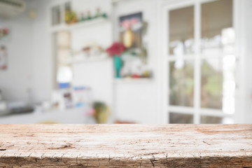 Wood desk space and blurred of kitchen background. for product display montage. business presentation.