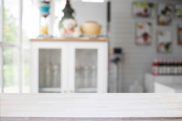 Wood desk space and blurred of kitchen background. for product display montage. business...