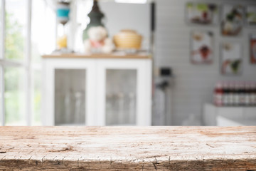 Wood desk space and blurred of kitchen background. for product display montage. business presentation.