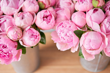 Pink Angel Cheeks peonies in a metal vase. Beautiful peony flower for catalog or online store. Floral shop concept . Beautiful fresh cut bouquet. Flowers delivery