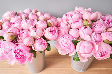 Pink Angel Cheeks peonies in a metal vase. Beautiful peony flower for catalog or online store. Floral shop concept . Beautiful fresh cut bouquet. Flowers delivery