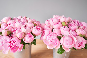 Pink Angel Cheeks peonies in a metal vase. Beautiful peony flower for catalog or online store. Floral shop concept . Beautiful fresh cut bouquet. Flowers delivery