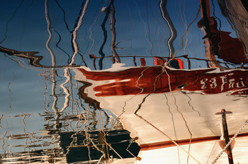 Ship reflection in water.