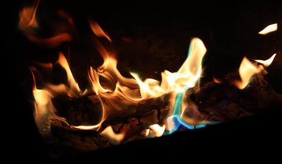 Fire flames on black background. Closeup. night