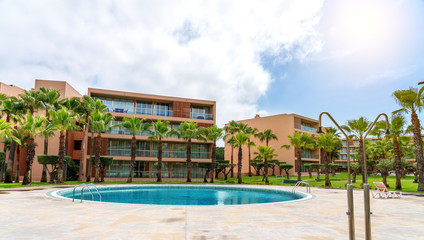 Fototapeta na wymiar Modern luxurious pool with clean, clear, blue water on site.
