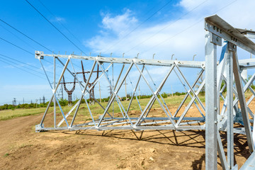 High voltage electric pillar from under. A high-voltage electricity tower