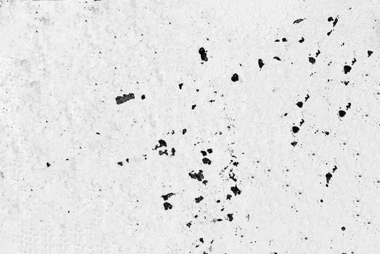 Texture of a concrete wall with cracks and scratches which can be used as a background