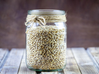 Pearl barley in a glass jar.