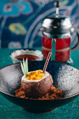 Good looking dessert coconut with cocoa and mango