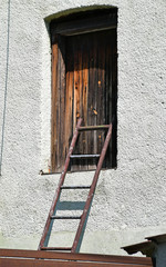 Door of the loft and a laddar