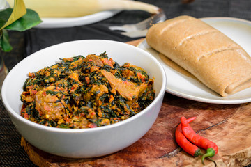 Delicious Combination: Amala and Vegetable in a Bowl, A Nigerian Culinary Delicacy Delight