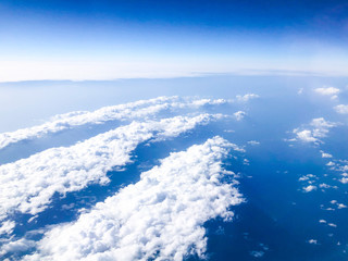 Naklejka na ściany i meble Blue sky taken on a plane