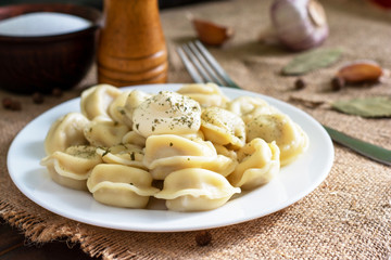 Homemade dumplings in a rustic style. Dumplings, dumplings. Dumplings with filling.