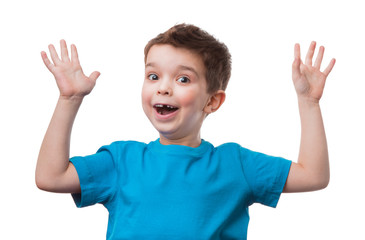 Cheerful little boy raised his hands up, isolated on white background