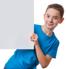 Boy holding empty white empty a sign, isolated on white background