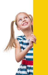 Positive little girl holding empty yellow square a sign, isolated on white background
